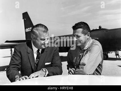 GARY POWERS (1929-1977) American pilot at right shot down in a CIA U-2 spy plane over the Soviet Union in 1960 with Lockheed designer Kelly Johnson in front of a U-2 in 1966 after the exchange which freed Powers. Stock Photo