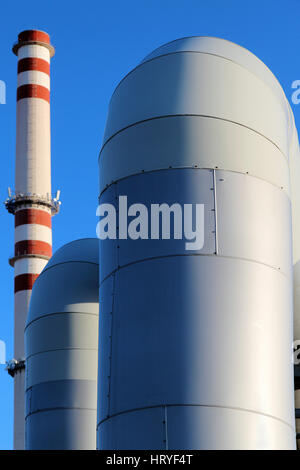 huge pipe in steel factory under blue sky Stock Photo