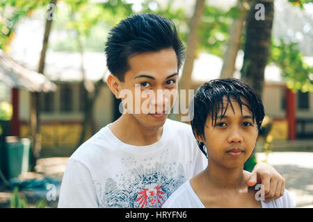 Young Asian couple on summertime vacation Stock Photo
