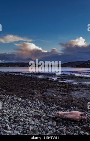View of Cuillin Hills from Bayfield at Loch Portree, Isle of Skye, Scotland, on a winter's afternoon. Stock Photo