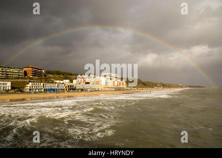 Full rainbow and stormy sky over Boscombe Beach, Bournemouth, Dorset, UK. 5th March, 2017. Stock Photo