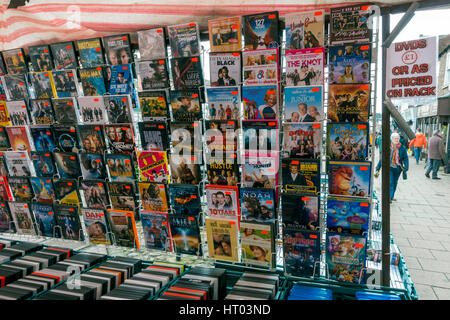 A display of used  film DVD's priced at £1 each for sale on a market stall in Northallerton North Yorkshire UK Stock Photo