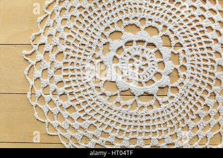 Beautiful vintage doily  lace crochet napkins on  table close up Stock Photo