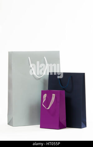 Silver, black and purple paper bag on a white background Stock Photo