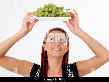 Junge Frau mit Weintrauben - young woman with grapes Stock Photo