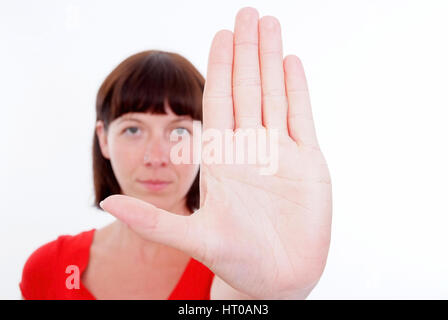 Woman With Sprawled Out Hand Symbolic For Stop Stock Photo Alamy