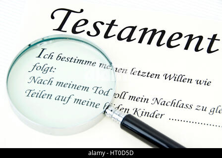 Symbolbild Testament unter der Lupe - symbolic for testament under loupe Stock Photo
