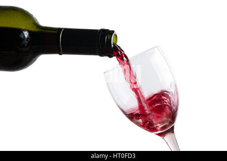 pour red wine in glass Stock Photo