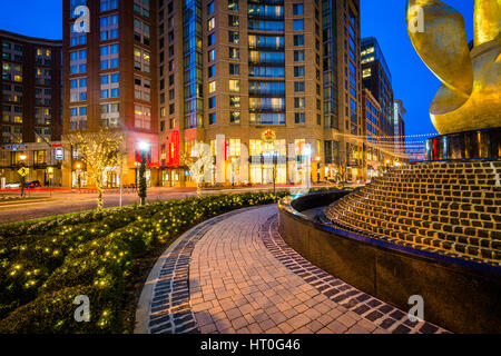 The National Katyń Memorial and modern buildings at night, in Harbor East, Baltimore, Maryland. Stock Photo