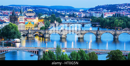 Image of Prague bridges over Vltava river, capital city of Czech Republic, during twilight blue hour,Prague,Czech Republic Stock Photo