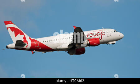 Air Canada Rouge plane Airbus A319 airborne Stock Photo