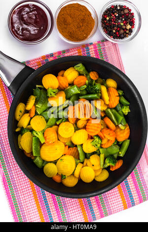 Vegetables in frying pan, top view Stock Photo