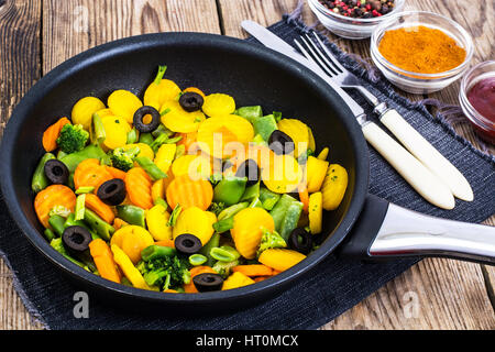 Stewed vegetable mix with olives Stock Photo - Alamy
