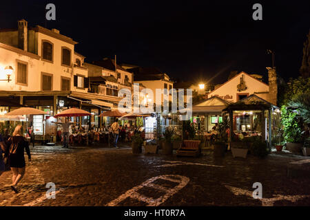 Open air restaurants at night in the Old Town of Funchal, Madeira Stock Photo