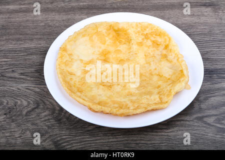 Indian bread on the plate in wood background Stock Photo