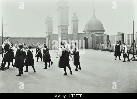 Playing netball, Myrdle Street Girls School, Stepney, London, 1908. Artist: Unknown. Stock Photo