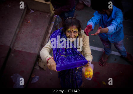 Residents of Barsana near Mathura in Uttar Pradesh celebrated 'Laddoo Holi' by smearing one another with coloured powder and distributing 'Laddoos' to mark the Holi. 'This is to please the Lord Banke Bihari and Radha Rani. We feel very happy celebrating this festival by tossing Laddoos at one another,' said a devotee. The flung Laddoos are pocketed with reverence as blessed offerings and hence the name 'Laddoo Holi'. Barsana, about 50 kilometres from Mathura, has the distinction of having the only temple dedicated to Lord Krishna's consort Radha. In Vrindavan and Mathura, where Lord Krishna is Stock Photo