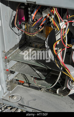 Graphic card, wires and other components of an old computer Stock Photo