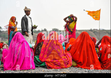 Group of Rajasthani Bhil women, wearing brightly coloured saris Stock Photo