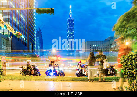 TAIPEI, TAIWAN - NOVEMBER 19: This is a street view of downtown Xinyi district and Taipei 101 building at night time on November 19, 2016 in Taipei Stock Photo