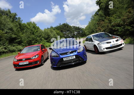 VW Golf GTi Renault Megane Sport R26R and Ford Focus RS 2009. Artist: Simon Clay. Stock Photo