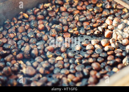 Roasted Chestnuts Served in a Chestnut Pan Isolated on White Background.  View from Above Stock Photo - Image of abstract, pile: 199468426