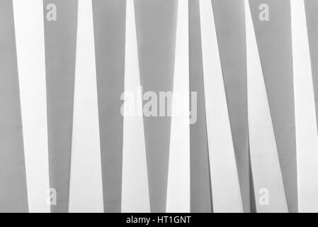 White folded sheet of paper showing an abstract texture design under the light grazing. Good to use as background Stock Photo