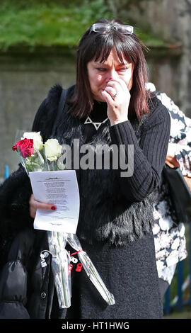 Family and friends of those who died in the Zeebrugge ferry disaster, leave a service at St Mary's Church in Dover, Kent, marking the 30th anniversary of the disaster. Stock Photo