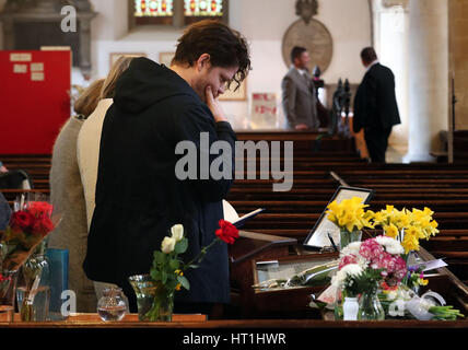 Family and friends of those who died in the Zeebrugge ferry disaster, view a memorial board to those who died following a service at St Mary's Church in Dover, Kent, marking the 30th anniversary of the disaster. Stock Photo