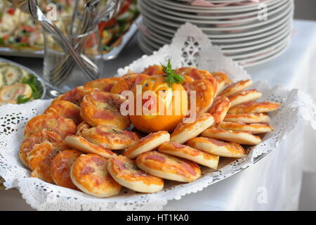 Setting of the table with food for breakfast, bread, beverage, shallow focus, cafe, hotel buffet, backer Stock Photo
