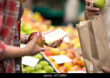 checking list customer at market Stock Photo