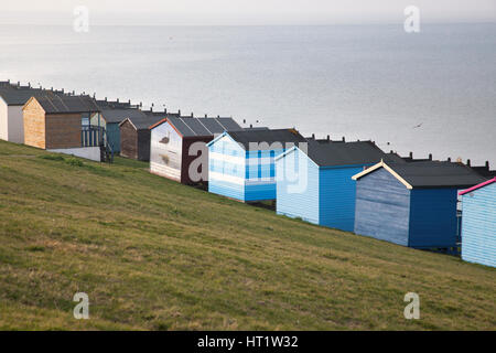 colored beach huts on the beach of Tankerton near Whitstable in Kent, UK Stock Photo