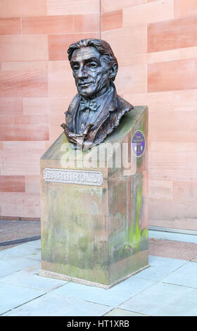 A bust of conductor Sir John Barbirolli outside the entrance to the Bridgewater Hall, Barbirolli Square, Manchester City centre, England UK with Stock Photo