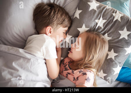 High angle view on sleeping siblings Stock Photo