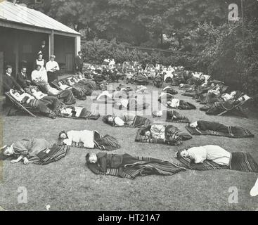 Children resting in the garden, Birley House Open Air School, Forest Hill, London, 1908.  Artist: Unknown. Stock Photo