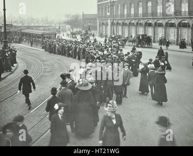 Long queue of people at Blackfriars Tramway shelter, London, 1912. Artist: Unknown. Stock Photo