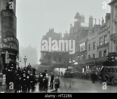 Crowd of people in the street, Tottenham Court Road, London, 1900. Artist: Unknown. Stock Photo