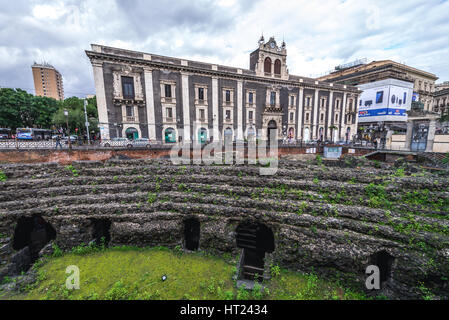 Tezzano Palace and Ruins of Roman Amphitheatre at Piazza Stesicoro (Stesicoro Square) in Catania city on the east side of Sicily Island, Italy Stock Photo