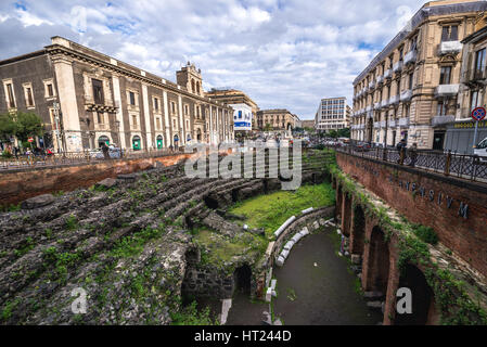 Tezzano Palace and Ruins of Roman Amphitheatre at Piazza Stesicoro (Stesicoro Square) in Catania city on the east side of Sicily Island, Italy Stock Photo