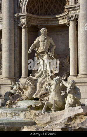 Oceanus god and triton taming a sea horse from the wonderful baroque Trevi Fountain, in the center of Rome Stock Photo