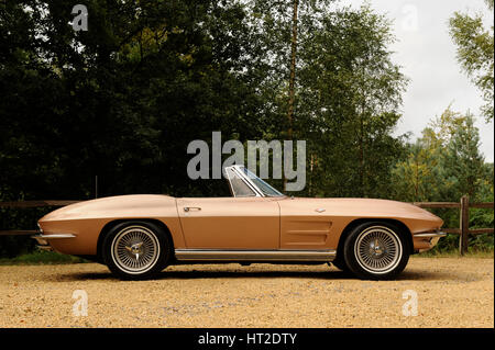 Chevrolet Corvette Stingray convertible 1964. Artist: Simon Clay. Stock Photo