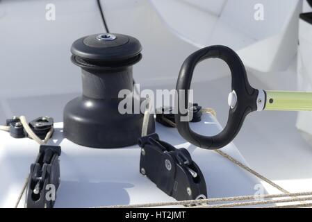 Details of winches and ropes on sailing boat racer, boating concept Stock Photo