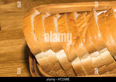 Fresh sliced white bread on a table Stock Photo
