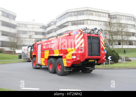 Luton, UK. 06th Mar, 2017. A major fire occurred at the Asda superstore on Wigmore Lane in Luton around lunchtime. An aerial platform tackles the blaze on the roof with at least 10 pumps in attendance. A London Luton Airport fire engine arrived for support. Credit: Nick Whittle/Alamy Live News Stock Photo