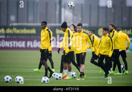 Dortmund, Germany. 7th Mar, 2017. Borussia Dortmund players around Sokratis (m.) on the training grounds in Dortmund, Germany, 7 March 2017. BVB will meet Benfica Lissabon in the second round second legs of the Champions League (8.03.). Photo: Bernd Thissen/dpa/Alamy Live News Stock Photo