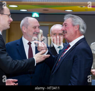 March 6, 2017 - Brussels, Belgium: Hungarian Minister of Foreign Affairs & External Economy Peter Szijjarto (L) is talking with the Polish Minister of National Defense Antoni Macierewicz (C) and the Luxembourg Minister of Foreign Affairs & Immigration Jean Asselborn (R) during an EU Defense and foreign affairs Ministers meeting in the Europa building, the EU Council headquarter. - NO WIRE SERVICE- Photo: Thierry Monasse/dpa Photo: Thierry Monasse/dpa Stock Photo