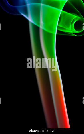 Colored smoke isolated on black background Stock Photo