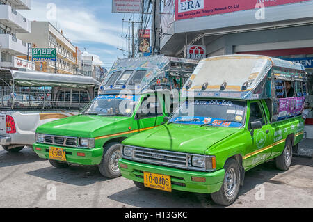HUA HIN, THAILAND - SEPTEMBER 23, 2010: Songthaew pick-up truck in the center of Hua Hin. Songthaews are used as public share taxis in Thailand with s Stock Photo