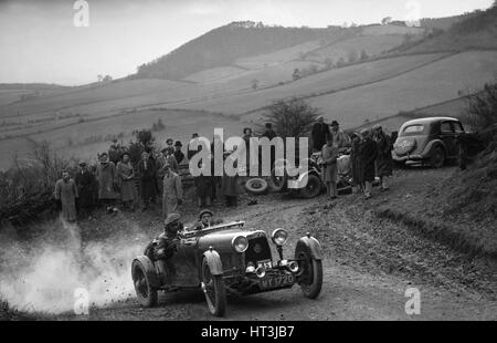 Aston Martin 2-seater of JD Keightley competing in the MG Car Club Midland Centre Trial, 1938. Artist: Bill Brunell. Stock Photo