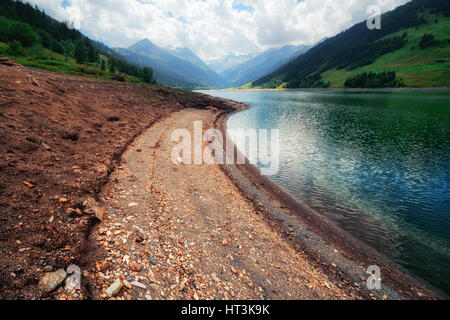 Amazing summer morning on the fantastic Speicher Durlassboden lake. Alps, Austria, Europe. Stock Photo